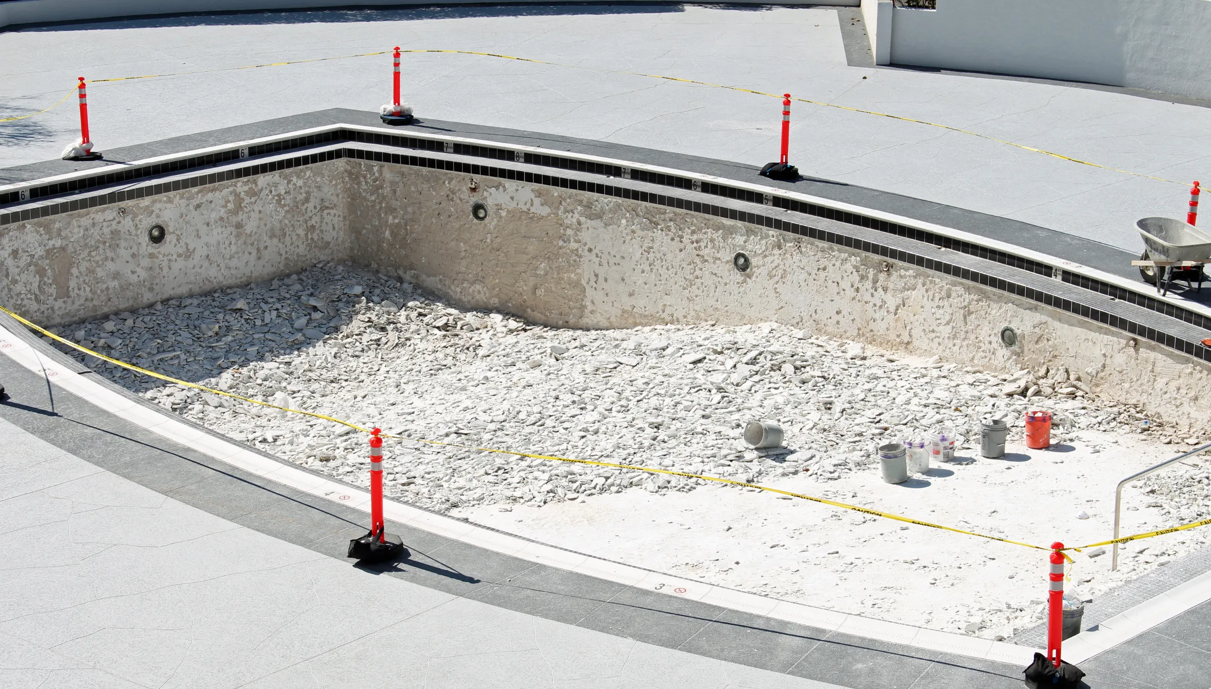 Pool demolition and removal in Dallas TX showing inground pool structure removed and site cleared for future use